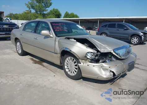 2004 Lincoln Town Car Signature из США, поврежденный, VIN 1LNHM81W44Y617901